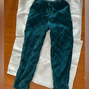 Vans never worn pants wrinkled from sitting in closet